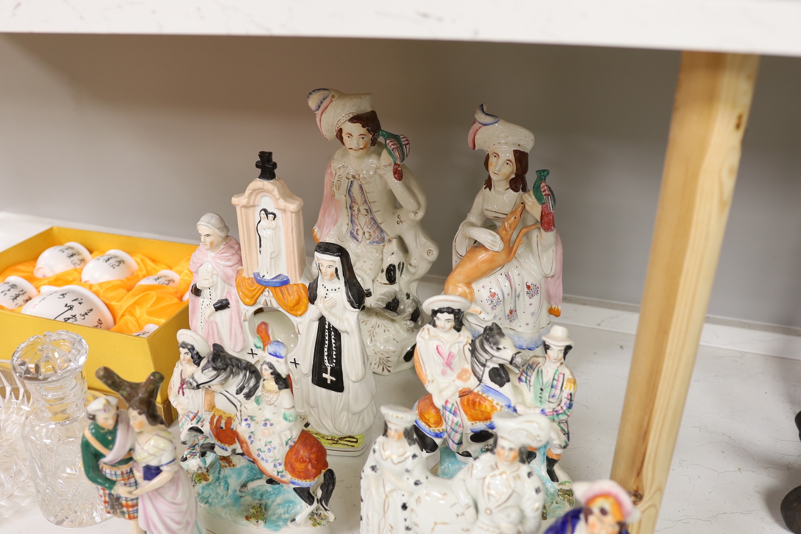 A collection of eight Victorian Staffordshire figures or groups, largest 36cm